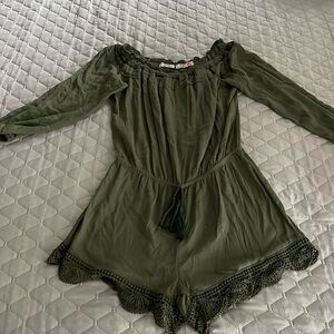 SOLD🌟Bundle 3/$30 🌟Riley romper. Cute details. Elastic neckline.